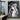 Hand-painted abstract figurative painting of layered female profiles in cool and muted colors