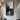Minimalist Abstract Painting In Black And Beige Tones With Split Horizon