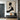 Hand-painted minimalist oil painting depicting a woman's profile silhouette in smooth black curves, contrasted against a textured ivory background with cream undertones and subtle brushstroke textures.?