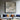 Minimalist abstract oil painting with neutral grey mountain-like textures