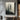 Minimalist Abstract Oil Painting Of Two Human Figures Standing In Foggy Black And White Landscape