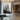 Minimalist Abstract Oil Painting Of Two Human Figures Standing In Foggy Black And White Landscape