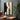 Abstract handmade oil painting of two mirrored profile silhouettes in black and beige