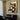 Modern abstract geometric artwork with stylized profile in warm earth tones