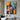"Neon Velocity" abstract oil painting in a pop art and graffiti style, featuring vibrant streaks of neon-like colors (yellow, red, blue) over a dark, abstracted urban background.
