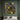Pollock-style drip painting with yellow and white splashes on black background
