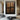 Original geometric abstract oil painting "Quadra Panels" depicting four textured brown rectangular panels against a dark background, creating a modern, structured look.
