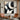 "Shadow & Light Abstract" oil painting in black, white, and grey, featuring a minimalist composition of textured abstract forms with a strong contrast between light and dark areas.
