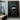 Black abstract graffiti-style oil painting of minimal figure with white and red lines, expressive hand-painted canvas wall art