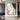 Minimalist abstract painting with beige, black, and soft blue textures on canvas
