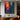 abstract expressionist oil painting of silhouette figure between red and blue city lights, modern vertical canvas with emotional color contrast