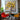 Still life oil painting of yellow sunflowers in a vase with heavy texture