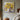 Still life oil painting of yellow sunflowers in a vase with heavy texture