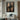 Abstract oil panting of four brown grid-lined garment silhouettes arranged in 2x2 grids against black background.