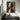 "Twin Visages" abstract oil painting featuring two symmetrical abstract faces rendered in black, white, and grey with a modern minimalist aesthetic and strong graphic quality.
