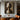 "Twin Visages" abstract oil painting featuring two symmetrical abstract faces rendered in black, white, and grey with a modern minimalist aesthetic and strong graphic quality.
