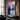 "Vertical Radiance" abstract painting featuring a vibrant interplay of pink and blue hues with a central luminous effect and dynamic, textured brushwork.

