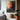 "Waning Ember" abstract oil painting featuring a moody composition of deep greys and blacks with a noticeable presence of orange hues, suggesting a sense of fading light or emotion.