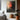 "Waning Ember" abstract oil painting featuring a moody composition of deep greys and blacks with a noticeable presence of orange hues, suggesting a sense of fading light or emotion.