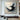 Abstract oil painting of a soaring bird formed by swirling black and white brush strokes