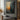 "Zen Profile Glow" abstract oil painting featuring a serene Buddha-like silhouette in profile on the right, with a dynamic abstract background of dark hues and gold accents on the left.
